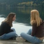 photo-two-girls-talking-on-dock-1 photo-two-girls-talking-on-dock-1